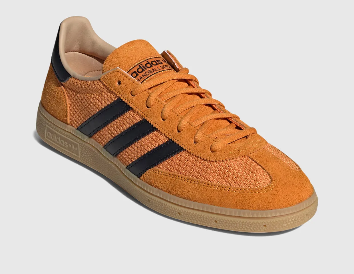 adidas Originals Handball Spezial Crew Orange / Core Black running in park shoes