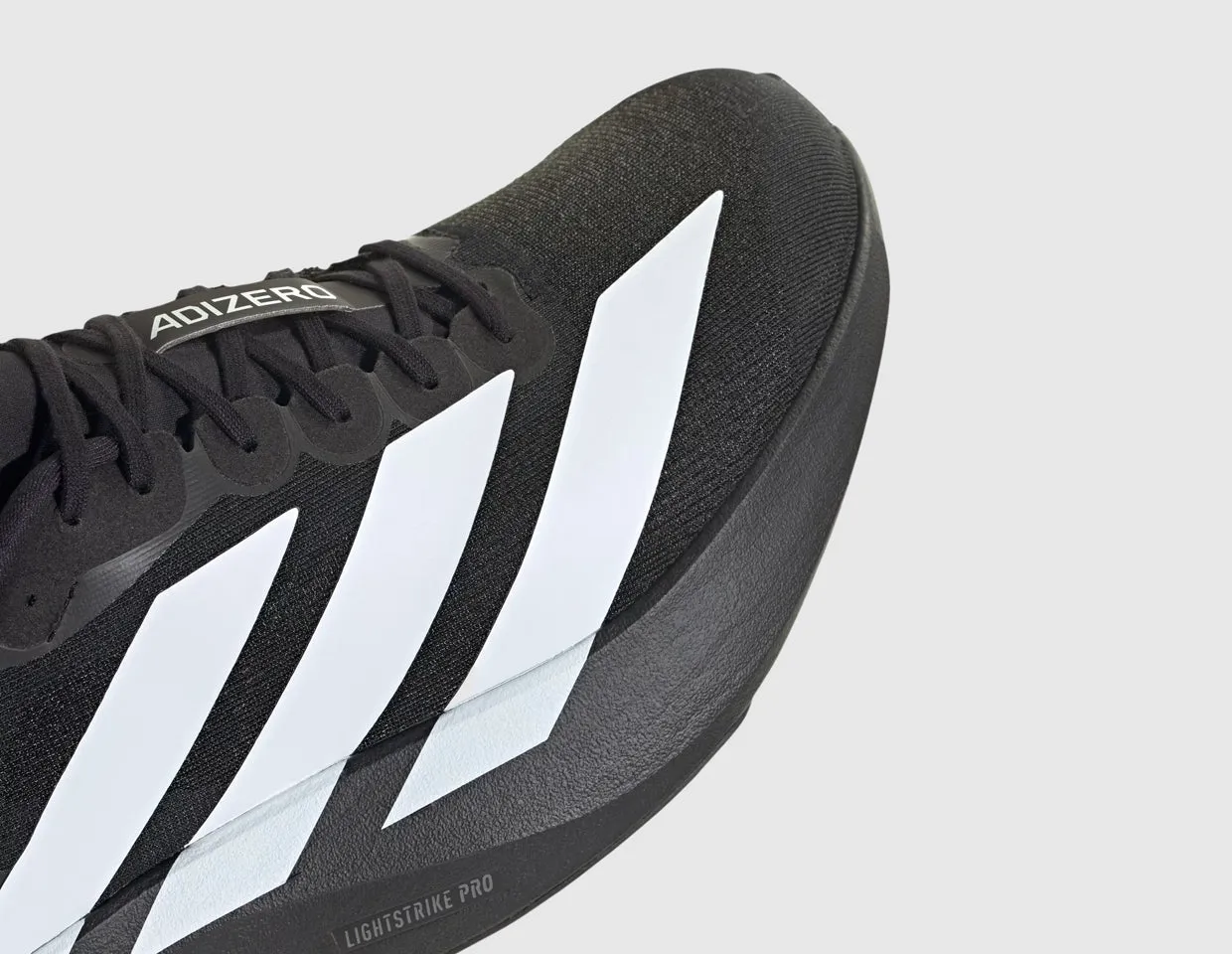 Step Stability outdoor track running option adidas Adizero Evo SL Core Black / Cloud White - Core Black