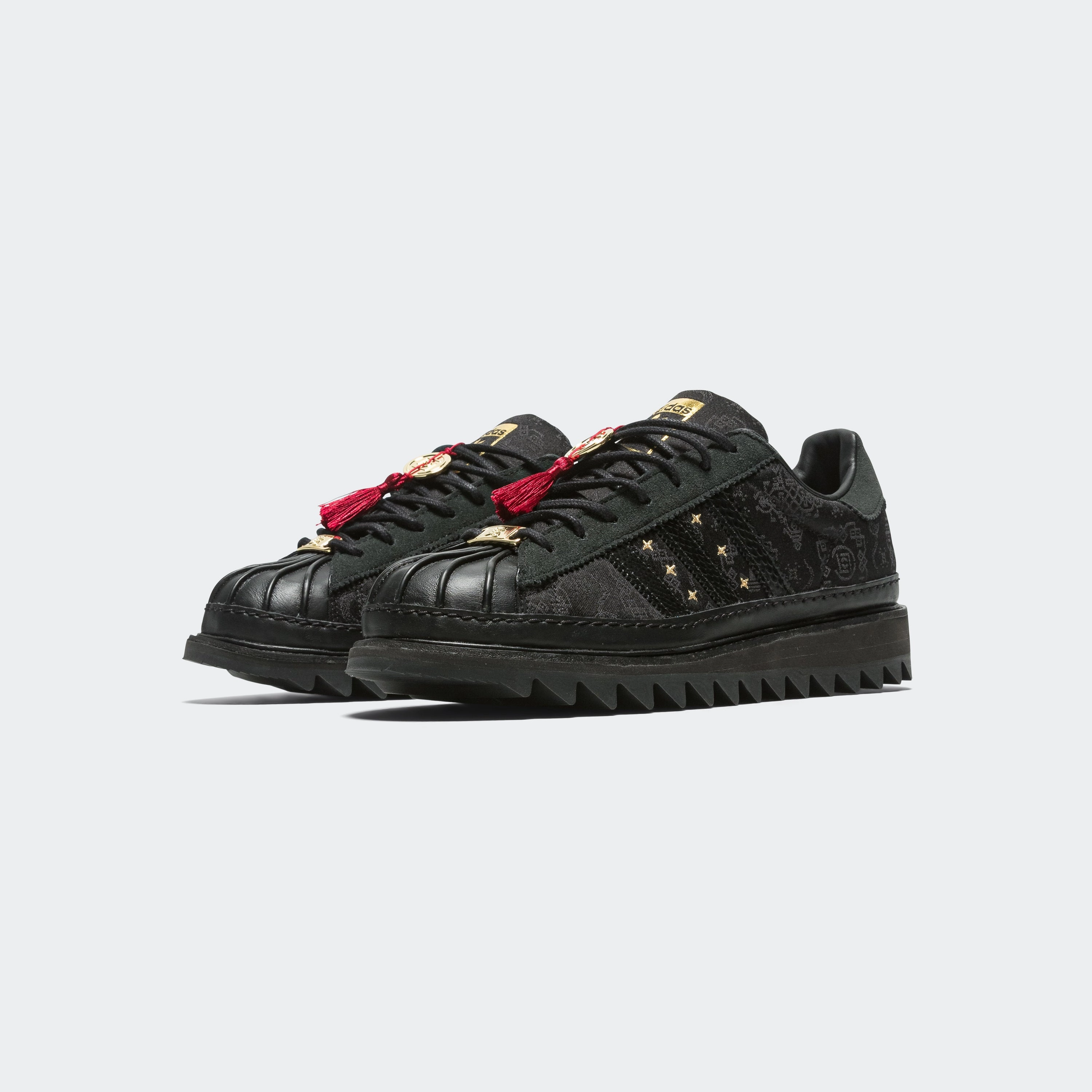 Air Cushion Sports-Friendly Superstar LNY by Edison Chen x CLOT - Core Black/Carbon-Gold Metallic