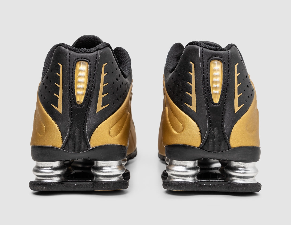 Nike Women's Shox R4 Black / Metallic Gold - Metallic Silver Airflow Venting Dynamic Fit System